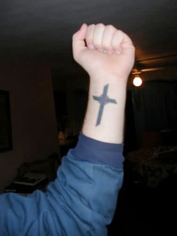 Spectacular Black Cross Wrist Tattoo