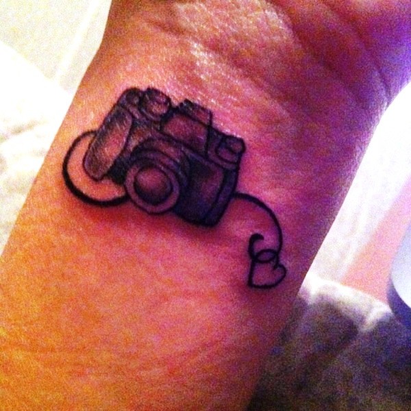 Stunning Camera Tattoo On Wrist