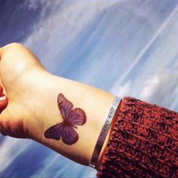 Sweet Butterfly Wrist Tattoo