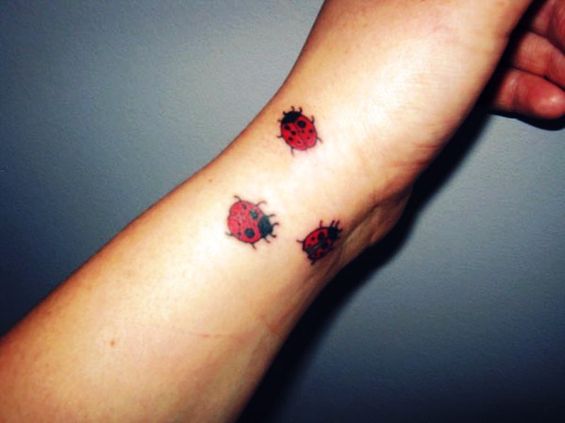 Three Ladybug Wrist Tattoo