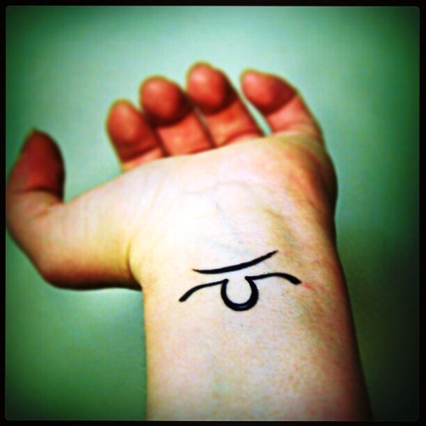 Tiny Black Libra Wrist Tattoo