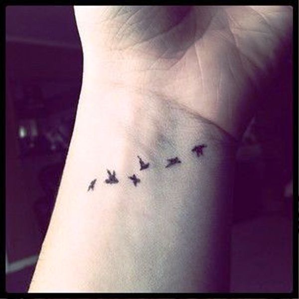 Tiny Little Flying Birds Tattoo Design