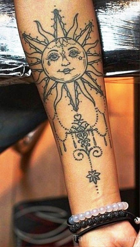 Traditional Sun Tattoo On Wrist