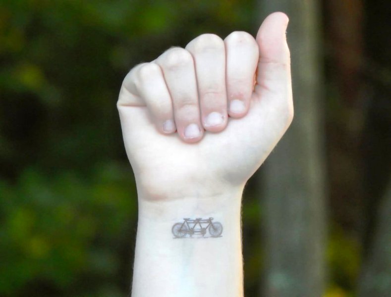 Two Cycle Wrist Tattoo