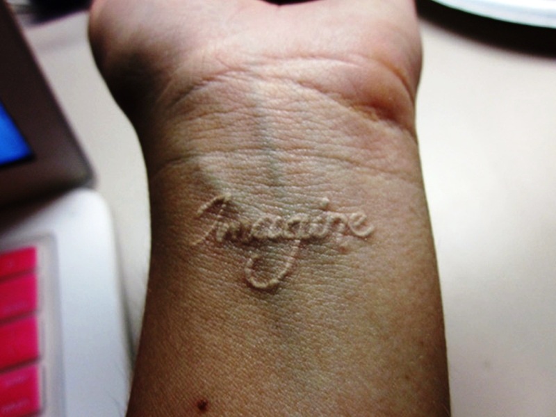 White Imagine Wrist Tattoo