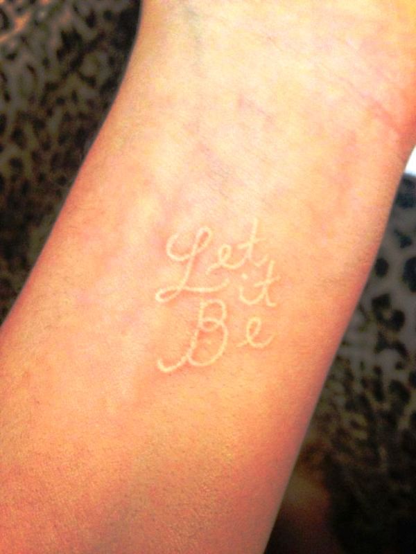 White Let It Be Tattoo On Wrist