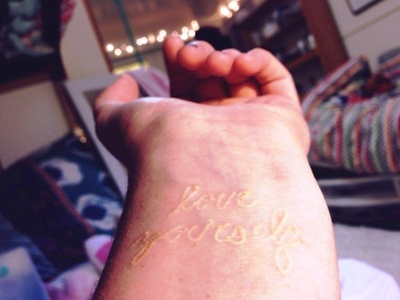 White Love Yourself Wrist Tattoo