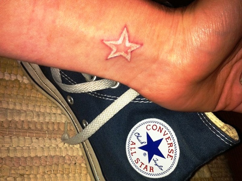 White Star Tattoo On Wrist