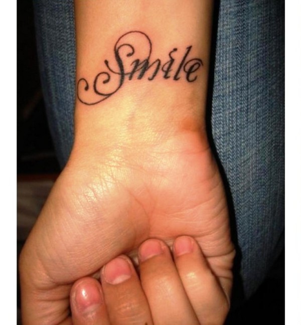 Wrist Smile Tattoo