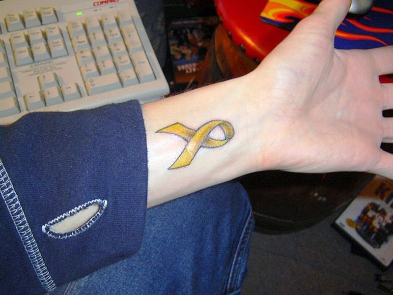 Yellow Cancer Ribbon Wrist Tattoo