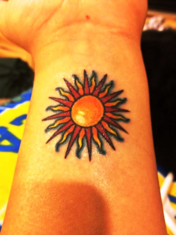 Yellow Sun Tattoo On Wrist