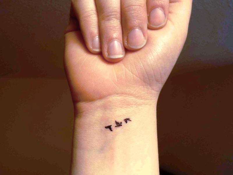 9. Small bird tattoo on neck for girls - wide 2