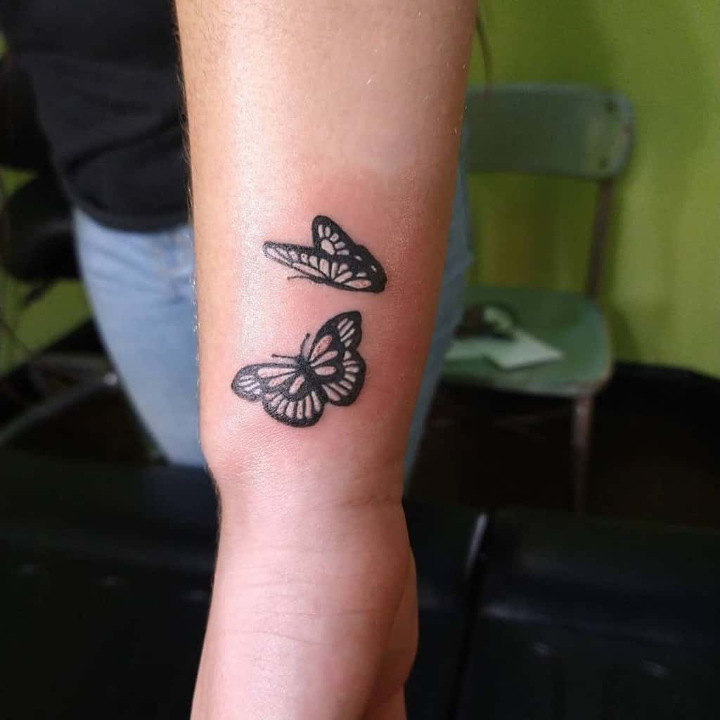 Black-Butterfly-Wrist-Tattoo-missyjahntattoos