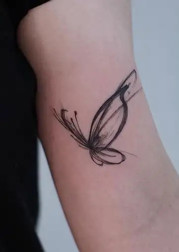 Modern-half-butterfly-tattoo-on-the-arm.jpg