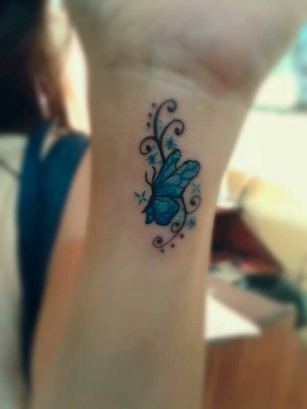 Tiny-Aqua-Blue-Butterfly-Tattoo-On-Wrist