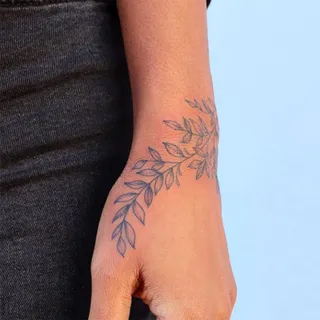 Classy Wrist Tattoo On Side 04
