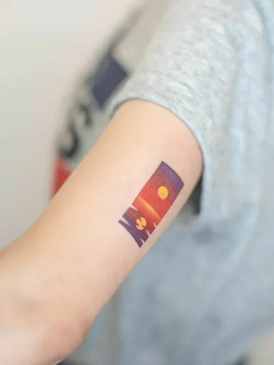 Small Sunset Tattoo On Wrist01